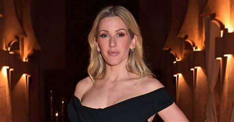 ellie goulding naked|Ellie Goulding poses topless during getaway with surf instructor。